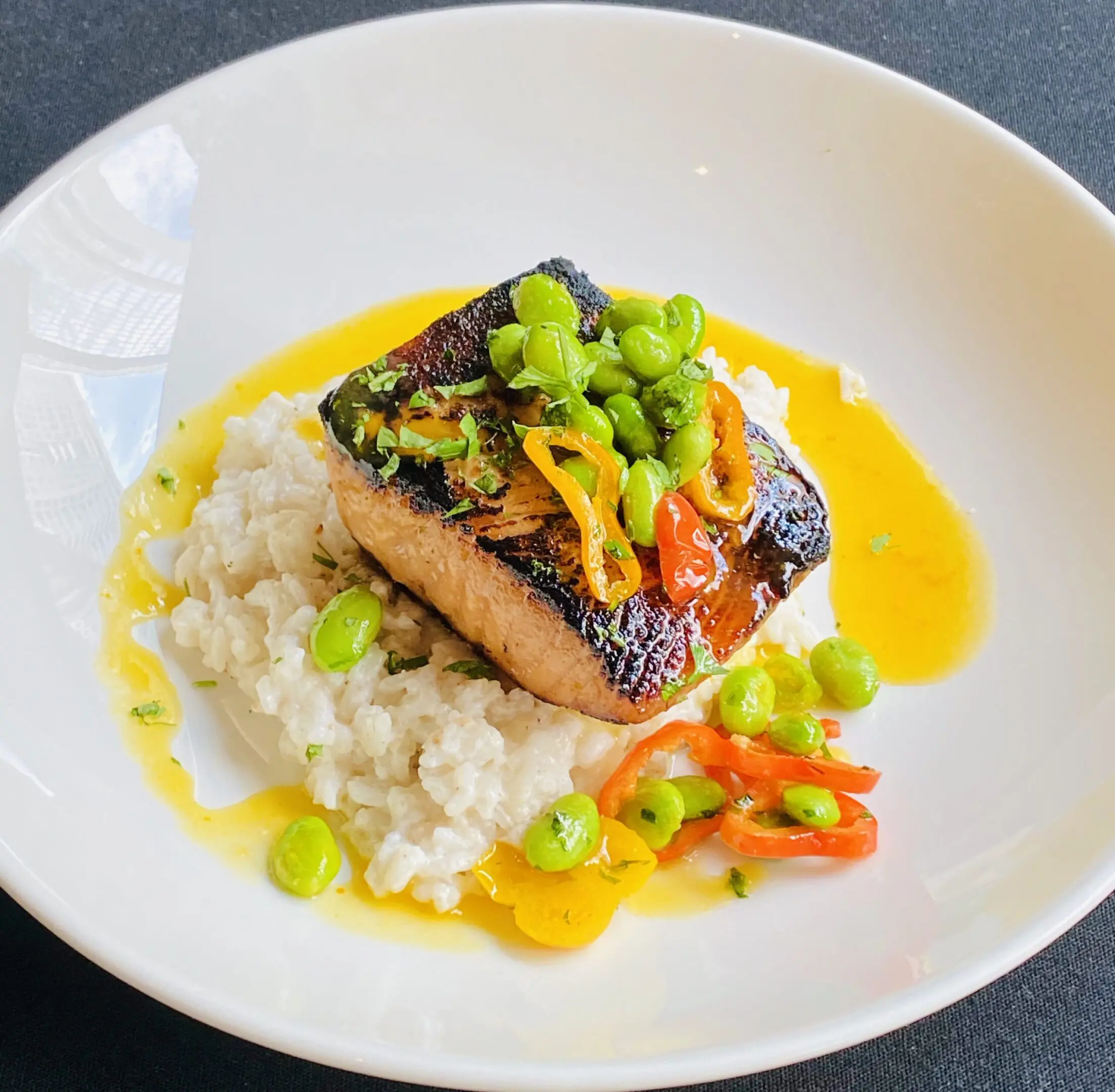 Salmon fillet on creamy rice